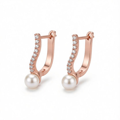 Pearl and 18K Rose Gold-Plated Huggie Earrings, rose gold huggie earrings, dainty minimalist design, side view
