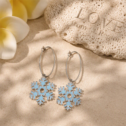 Lake Blue Enamel and Silver-Plated Snowflake Drop Earrings, silver huggie earrings, vintage-inspired design, lifestyle look