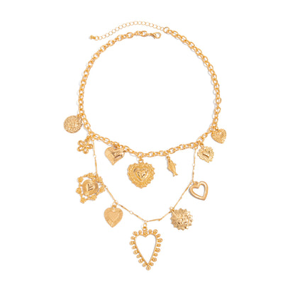 Goldtone Heart Flower Fish Statement Necklace, botanical inspired, front view