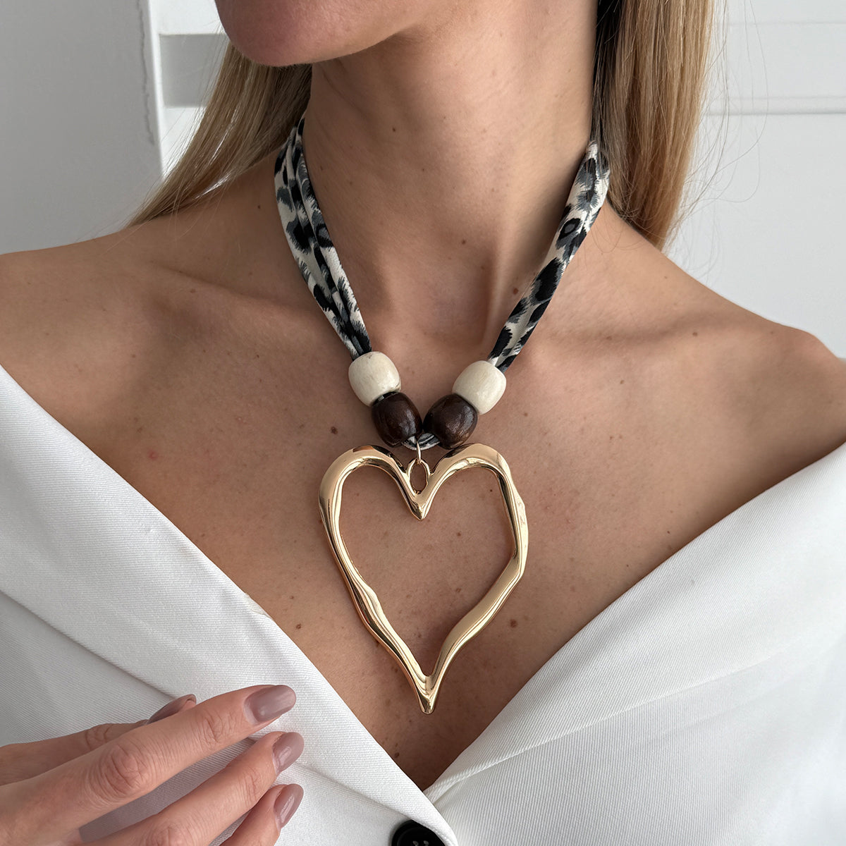 Polyster and White Wood Goldtone Open Heart Pendant Necklace, botanical inspired, lifestyle look