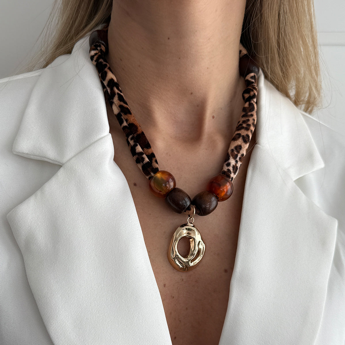 Polyster and Resin Wood Goldtone Pendant Leopard Print Necklace, vintage-inspired design, lifestyle look