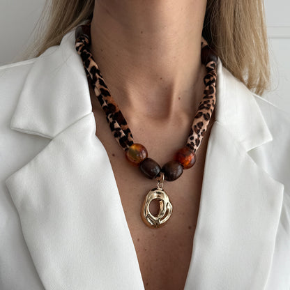 Polyster and Resin Wood Goldtone Pendant Leopard Print Necklace, vintage-inspired design, lifestyle look