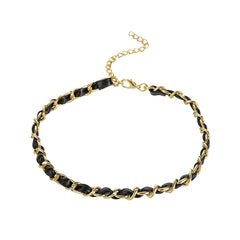 Chic black and gold chain choker, showcasing an elegant 18K gold-plated finish and a modern polystyrene cable chain.