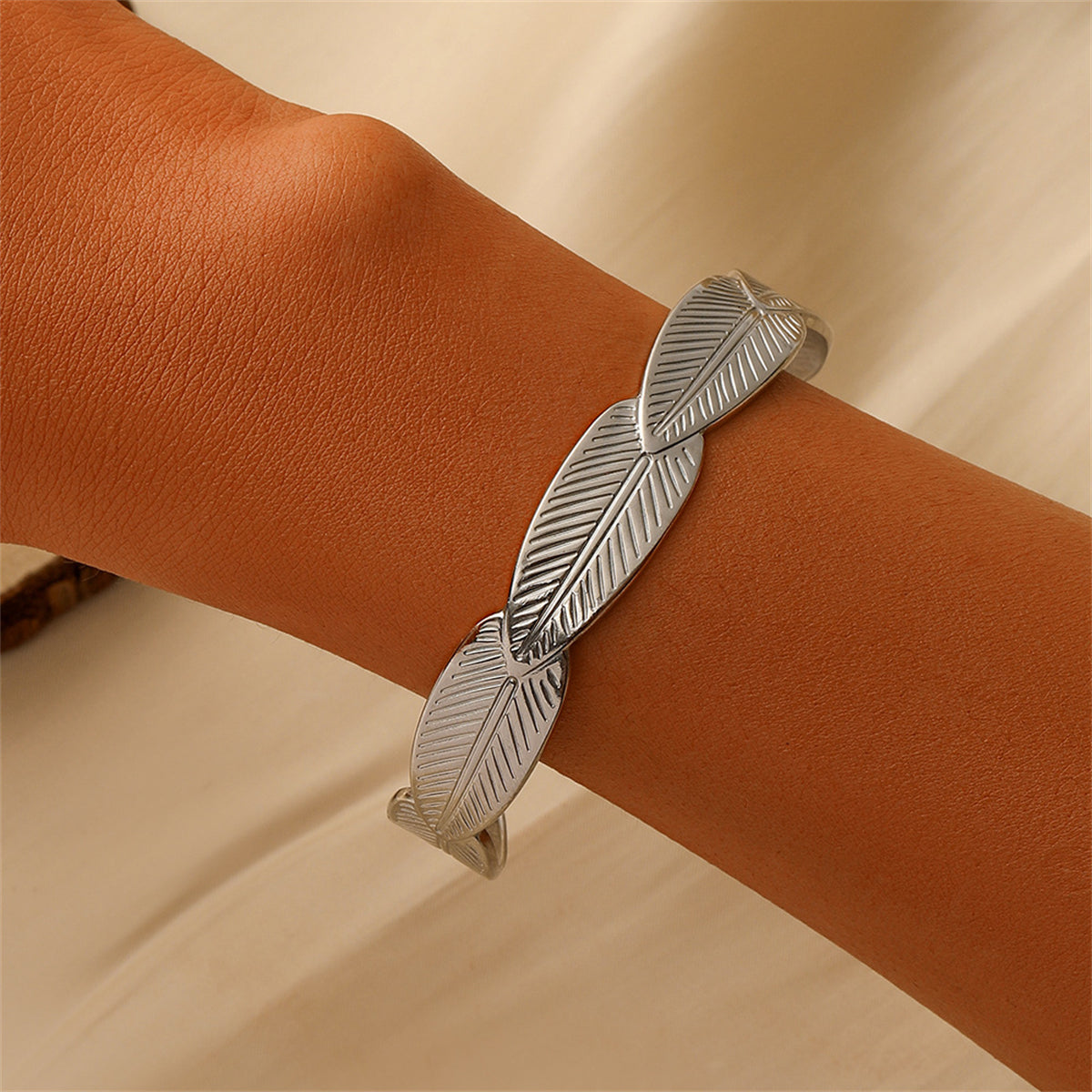 Silver-Plated Linked Feather Cuff, silver bracelet for women, botanical inspired, front view