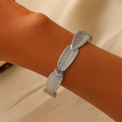 Silver-Plated Linked Feather Cuff, silver bracelet for women, botanical inspired, front view