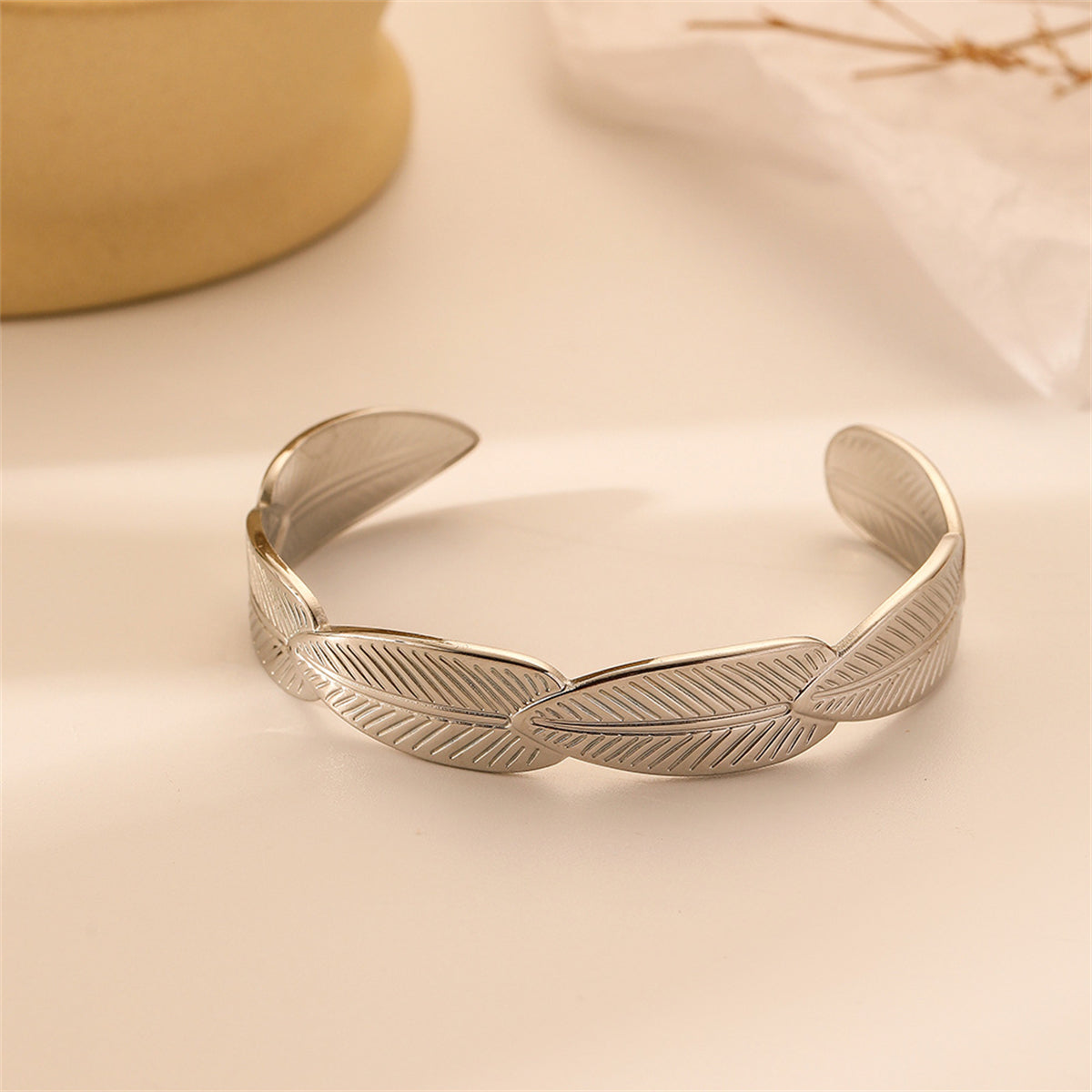 Silver-Plated Linked Feather Cuff, silver bracelet for women, botanical inspired, detail close-up