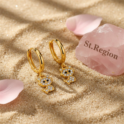 Cubic Zirconia and 18K Gold-Plated Kitty Huggie Earrings, gold huggie earrings, botanical inspired, detail close-up
