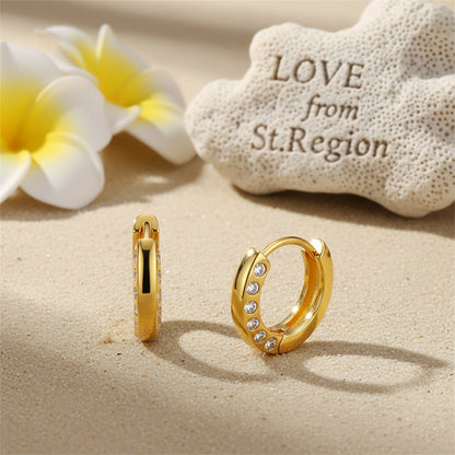 Cubic Zirconia and 18K Gold-Plated Huggie Earrings, gold huggie earrings, dainty minimalist design, lifestyle look