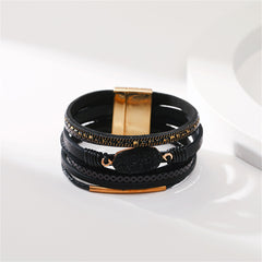 Stylish black leather bracelet adorned with luxurious 18K gold-plated accents, perfect for any outfit.