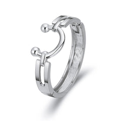 Silver ring with two spherical accents on the sides, designed as a saddle bangle for a stylish look.
