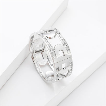 Cubic Zirconia and Silver-Plated Lock Bangle, silver bangle bracelet, vintage-inspired design, side view
