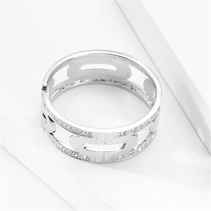 Cubic Zirconia and Silver-Plated Lock Bangle, silver bangle bracelet, vintage-inspired design, lifestyle look