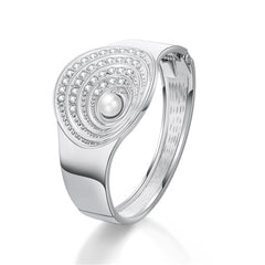 Elegant silver bangle adorned with a pearl and diamond design, alongside a cubic zirconia and pearl silver-plated shell bangle.
