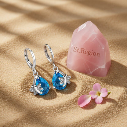 Blue Crystal and Cubic Zirconia Butterfly Teardrop Earrings, huggie earrings, dainty minimalist design, detail close-up