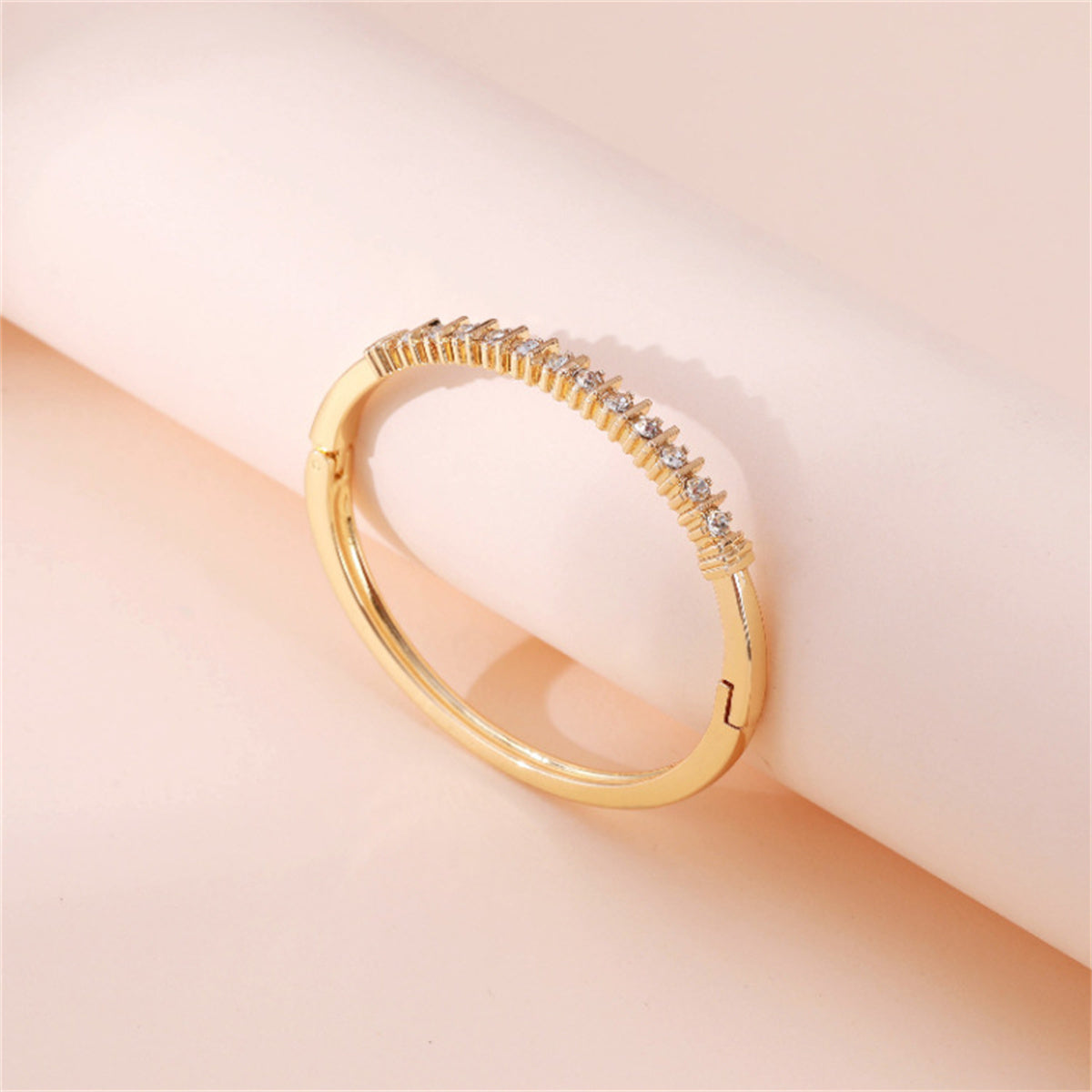 Cubic Zirconia and 18K Gold-Plated Hinged Bangle, gold bangle bracelet, vintage-inspired design, detail close-up