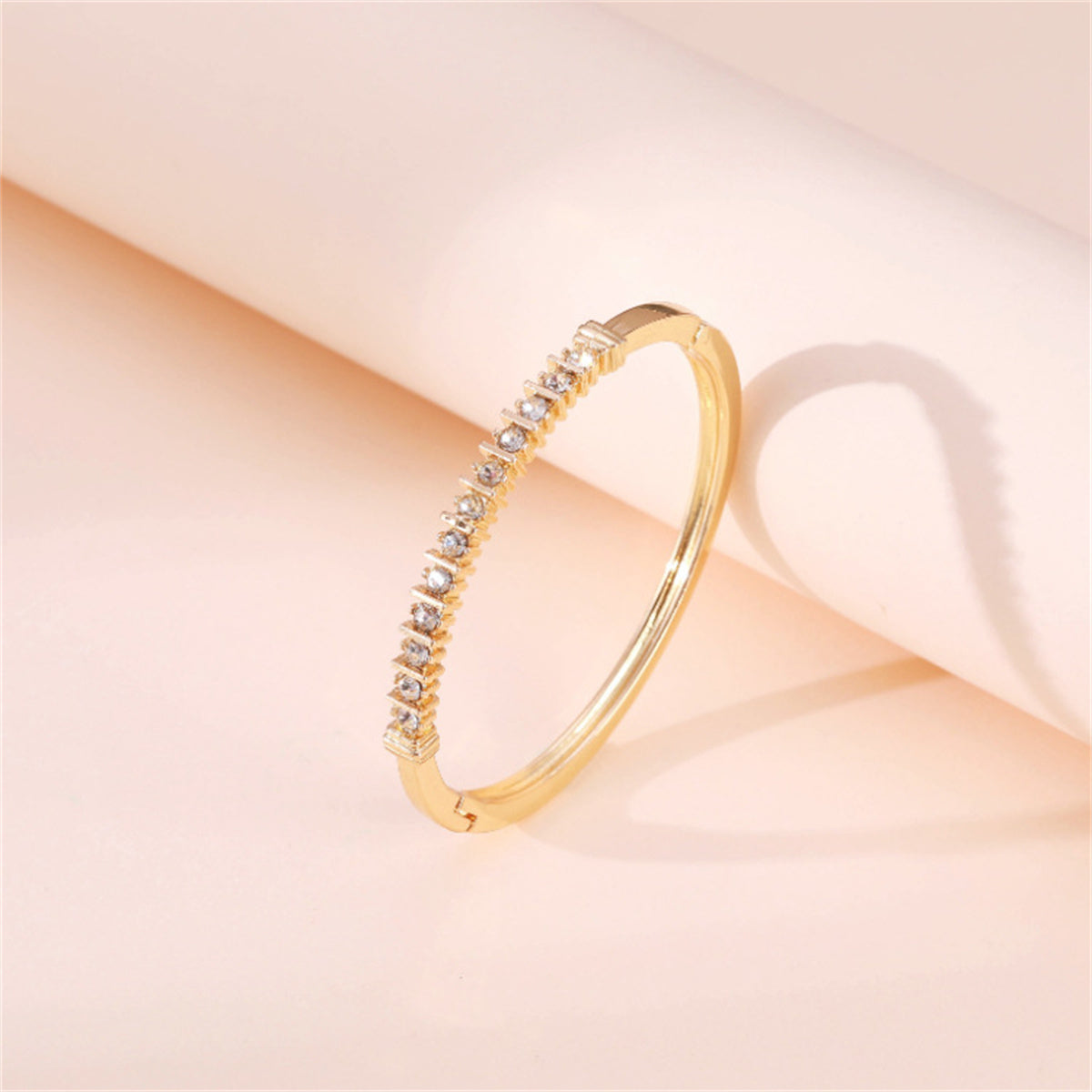 Cubic Zirconia and 18K Gold-Plated Hinged Bangle, gold bangle bracelet, vintage-inspired design, side view