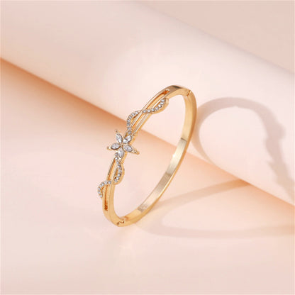 Cubic Zirconia and 18K Gold-Plated Floral Wave Marquise Hinge Bangle, gold bangle bracelet, detail close-up