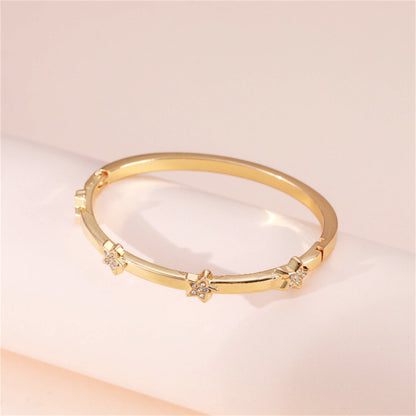 Cubic Zirconia and 18K Gold-Plated Star Station Bangle, gold bangle bracelet, vintage-inspired design, side view