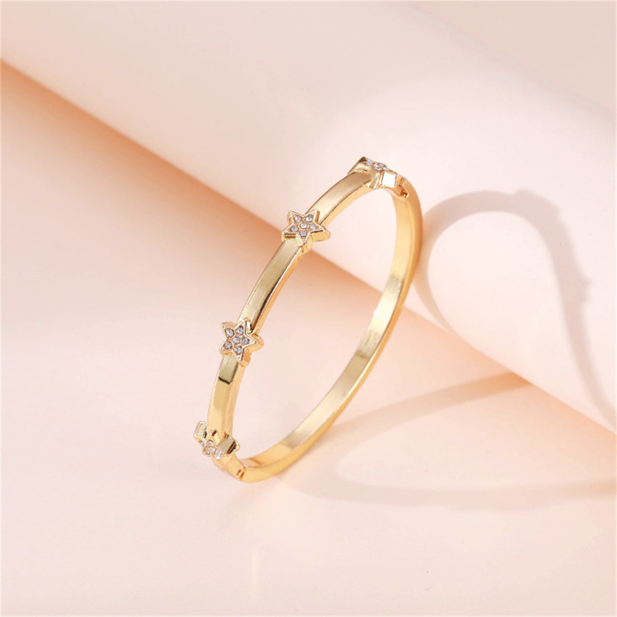 Cubic Zirconia and 18K Gold-Plated Star Station Bangle, gold bangle bracelet, vintage-inspired design, lifestyle look
