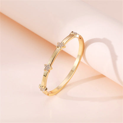 Cubic Zirconia and 18K Gold-Plated Star Station Bangle, gold bangle bracelet, vintage-inspired design, lifestyle look