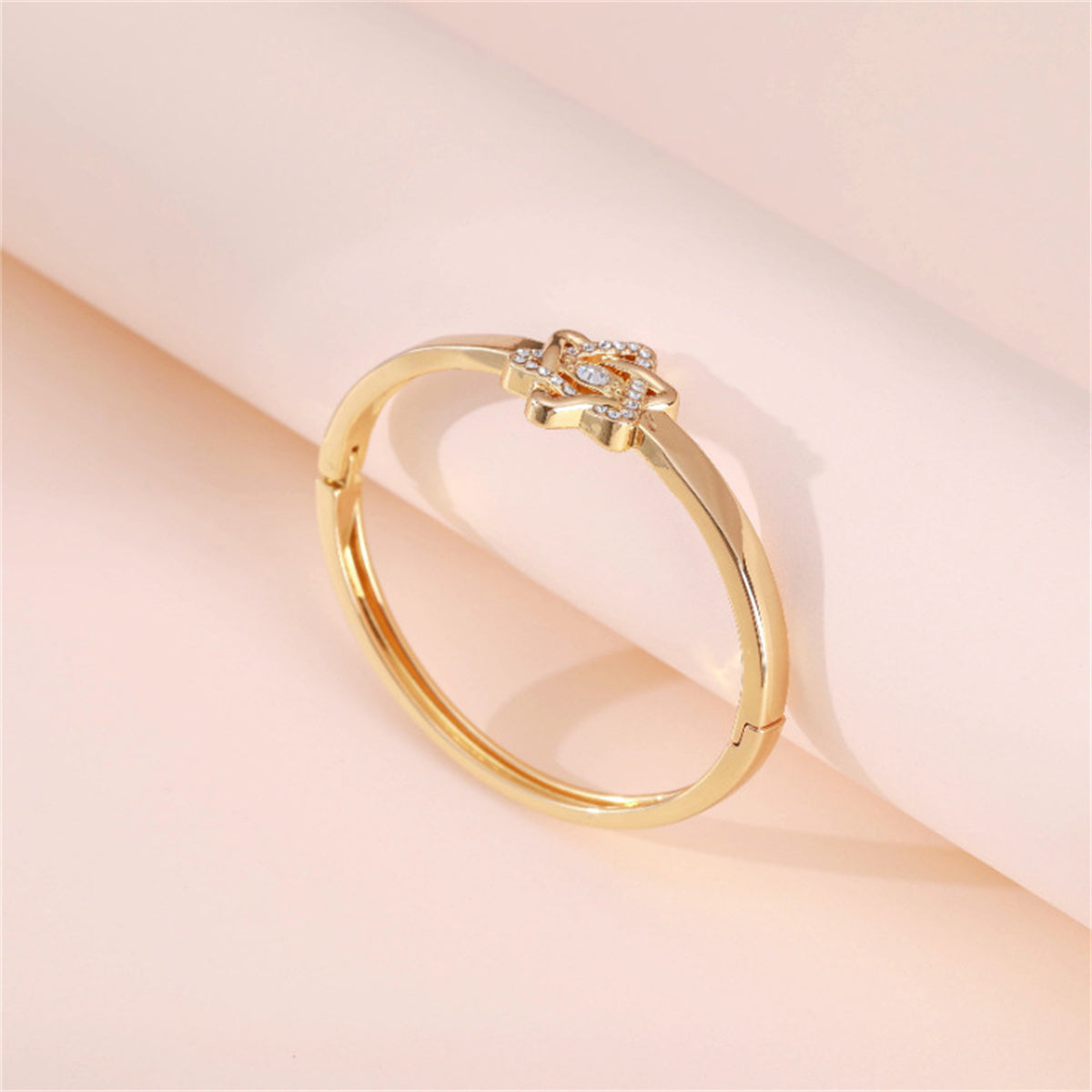 Cubic Zirconia and 18K Gold-Plated Flush-Set Openwork Star Hinge Bangle, gold bangle bracelet, lifestyle look