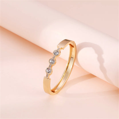 Cubic Zirconia and 18K Gold-Plated Bangle, gold bangle bracelet, everyday style, side view