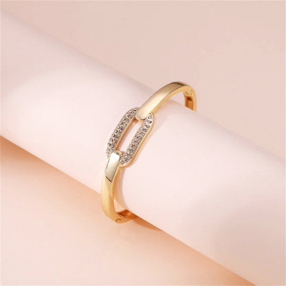 Cubic Zirconia and 18K Gold-Plated Oval Bangle, gold bangle bracelet, everyday style, side view
