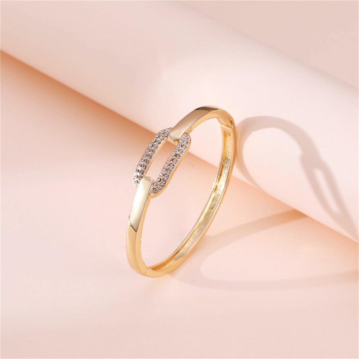 Cubic Zirconia and 18K Gold-Plated Oval Bangle, gold bangle bracelet, everyday style, detail close-up