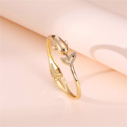 Cubic Zirconia and 18K Gold-Plated Openwork Dolphin Hinge Bangle, gold bangle bracelet, botanical inspired, side view