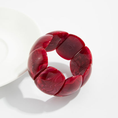 Dark Red Resin Petals Stretch Bracelet, botanical inspired, lifestyle look