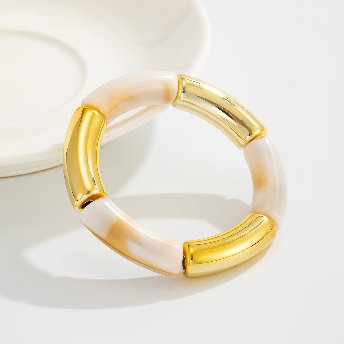 Beige Resin and Goldtone Joint Stretch Bracelet, vintage-inspired design, lifestyle look