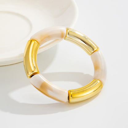 Beige Resin and Goldtone Joint Stretch Bracelet, vintage-inspired design, lifestyle look