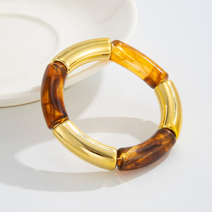 Amber Resin and Goldtone Joint Stretch Bracelet, dainty minimalist design, lifestyle look
