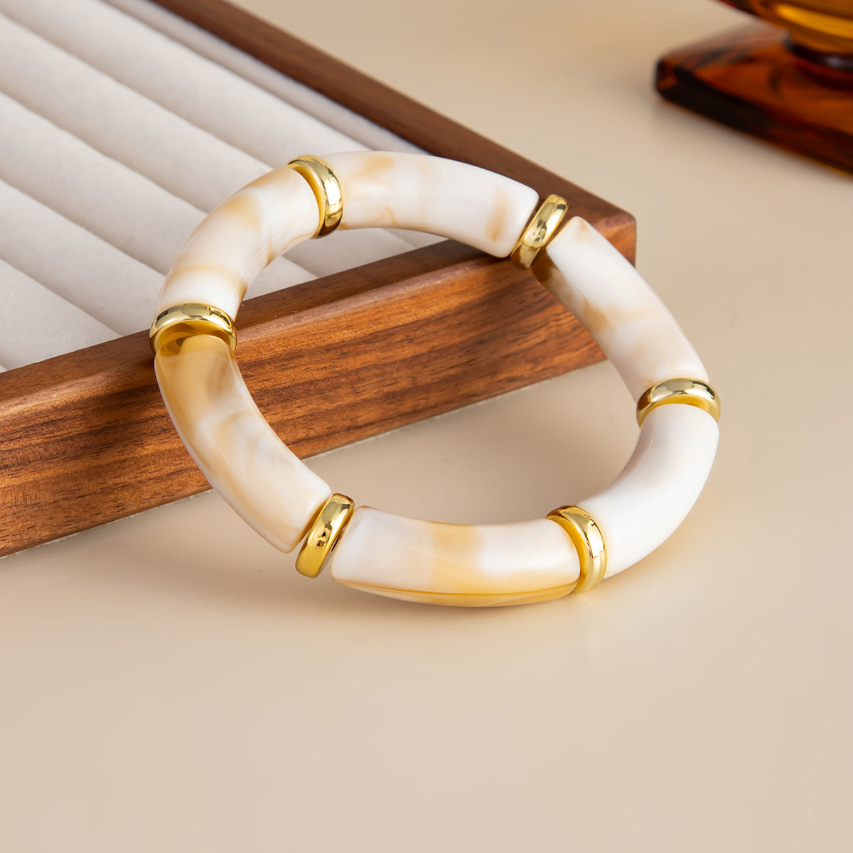 Beige Resin and Goldtone Sequin Joint Stretch Bracelet, vintage-inspired design, side view