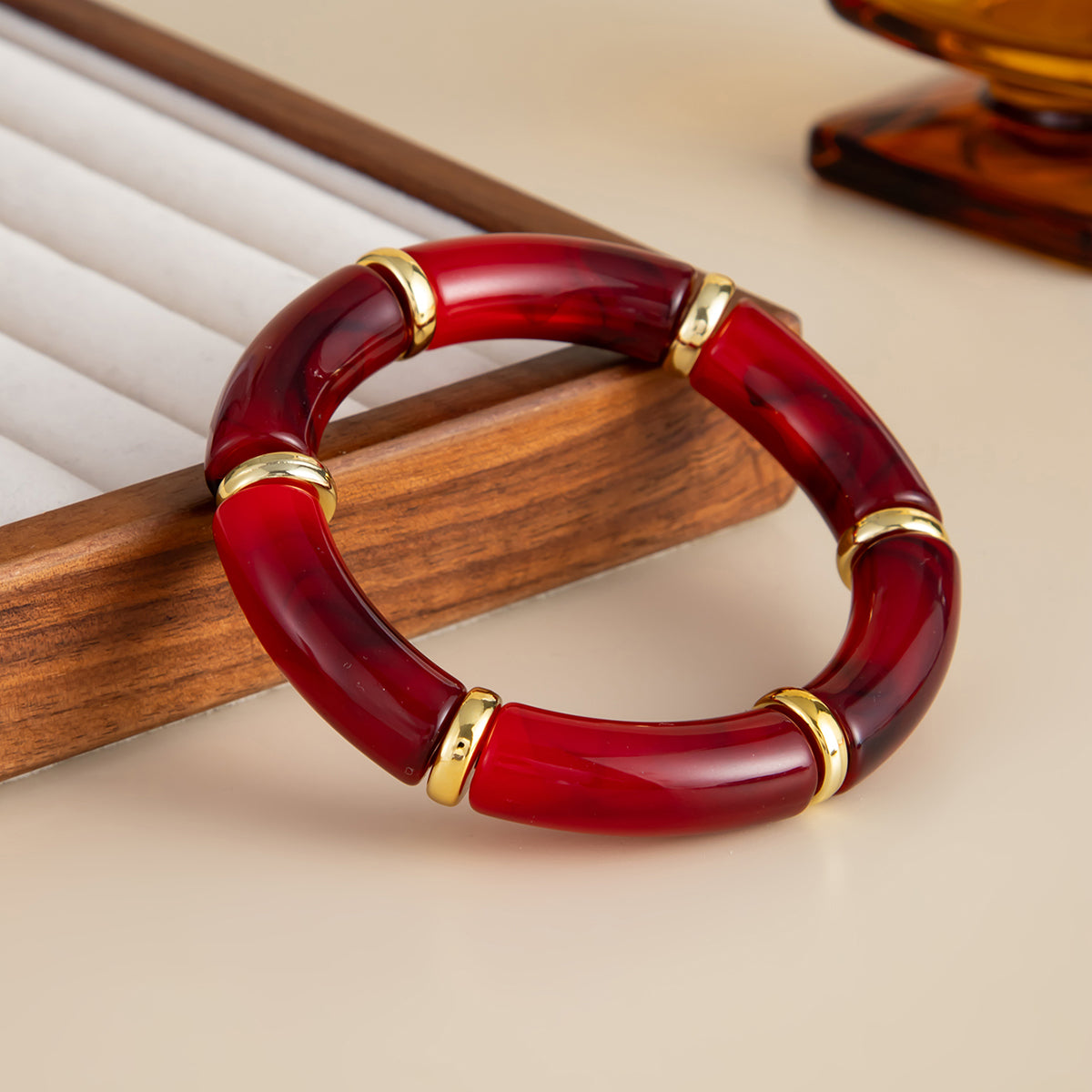 Wine Red Resin and Goldtone Sequin Joint Stretch Bracelet, vintage-inspired design, side view