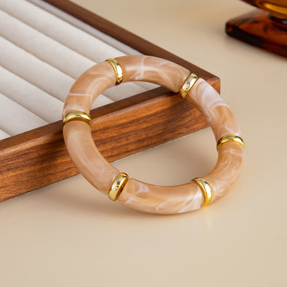 Tea Resin and Goldtone Sequin Joint Stretch Bracelet, vintage-inspired design, side view