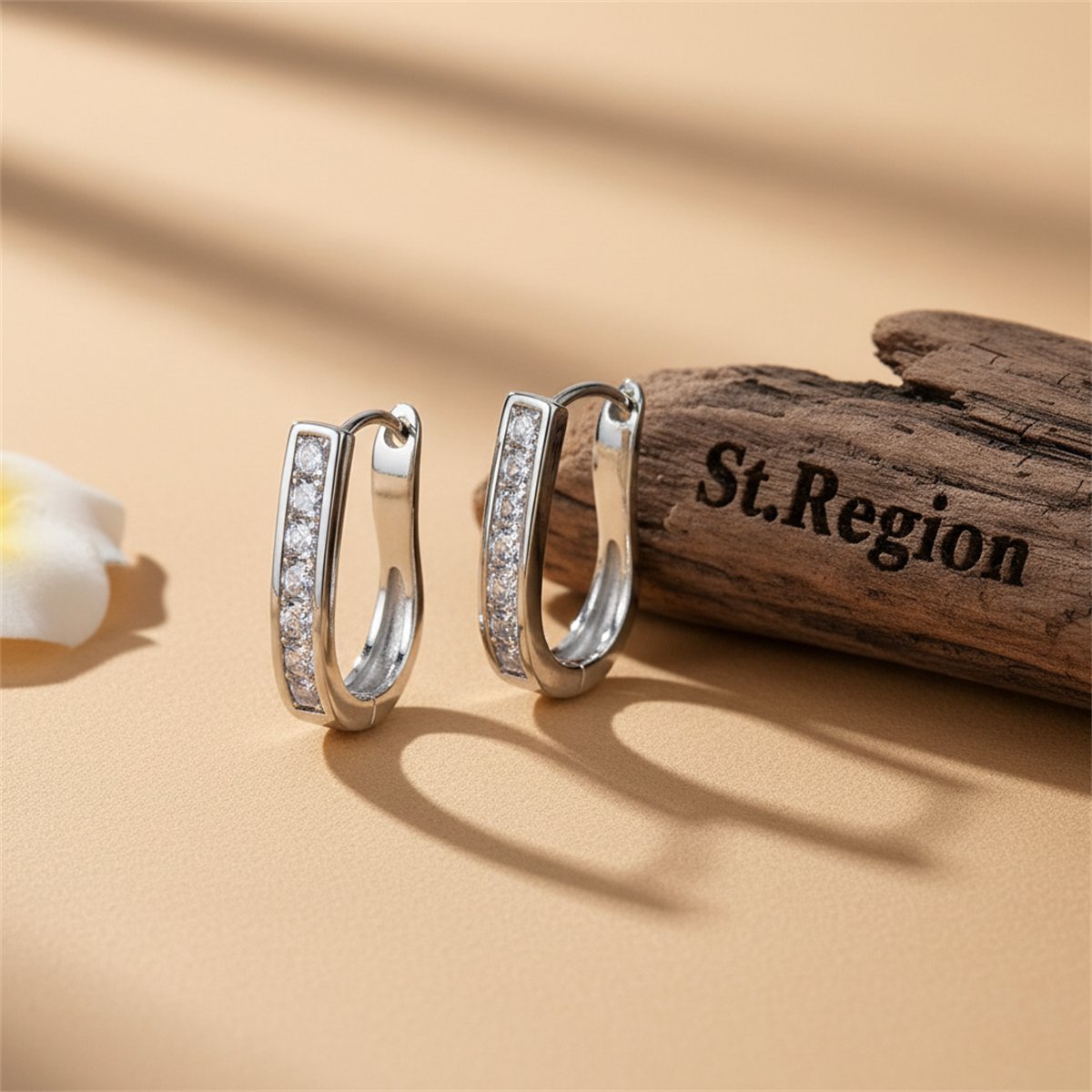 Cubic Zirconia and Silver-Plated U-Shape Huggie Earrings, silver huggie earrings, botanical inspired, front view