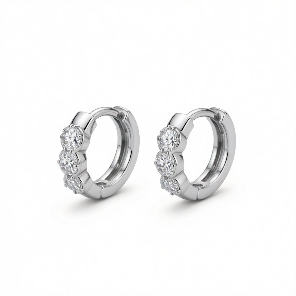 Cubic Zirconia and Silver-Plated Round Huggie Earrings, silver huggie earrings, vintage-inspired design, side view