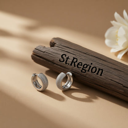 Silver-Plated Textured Huggie Earrings, silver huggie earrings, botanical inspired, front view