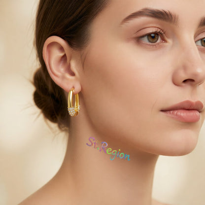 Cubic Zirconia and 18K Gold-Plated Teardrop Huggie Earrings, gold huggie earrings, vintage-inspired design, styled look