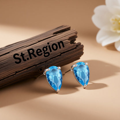Blue Crystal and Silver-Plated Pear-Cut Stud Earrings, silver stud earrings for women, vintage-inspired design, front view