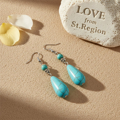 Turquoise and Silver-Plated Pear-Cut Drop Earrings, silver drop earrings for women, vintage-inspired design, lifestyle look