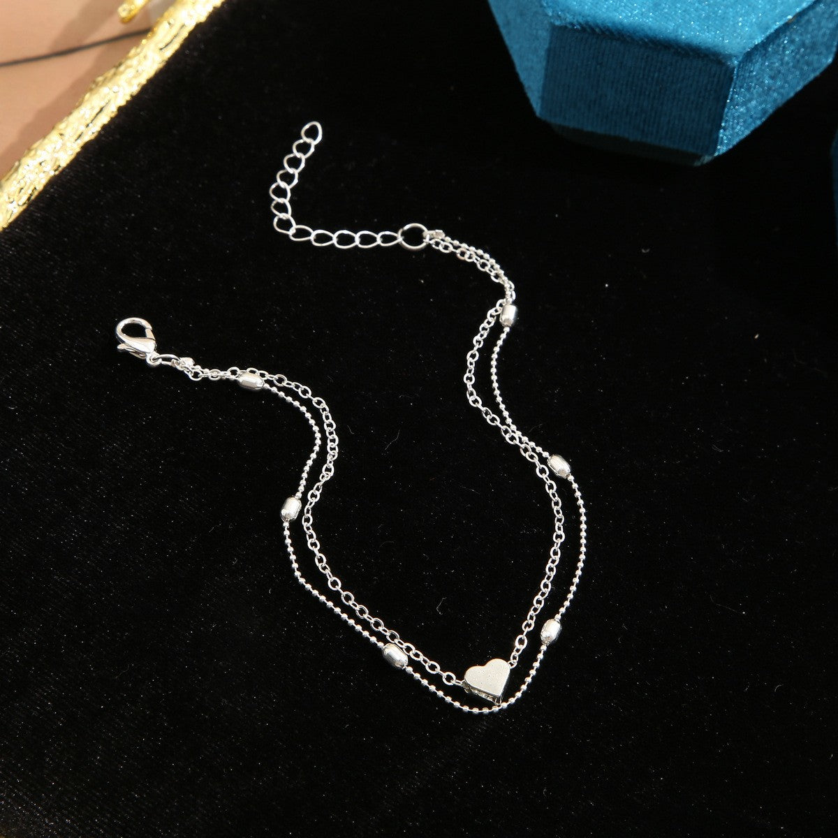 Silver-Plated Heart Charm Anklet and Station Anklet Set, silver anklet bracelet, botanical inspired, side view