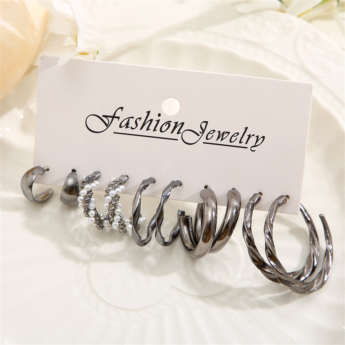 Pearl and Black-Tone Twisted Hoop Earrings Set, huggie earrings, vintage-inspired design, lifestyle look