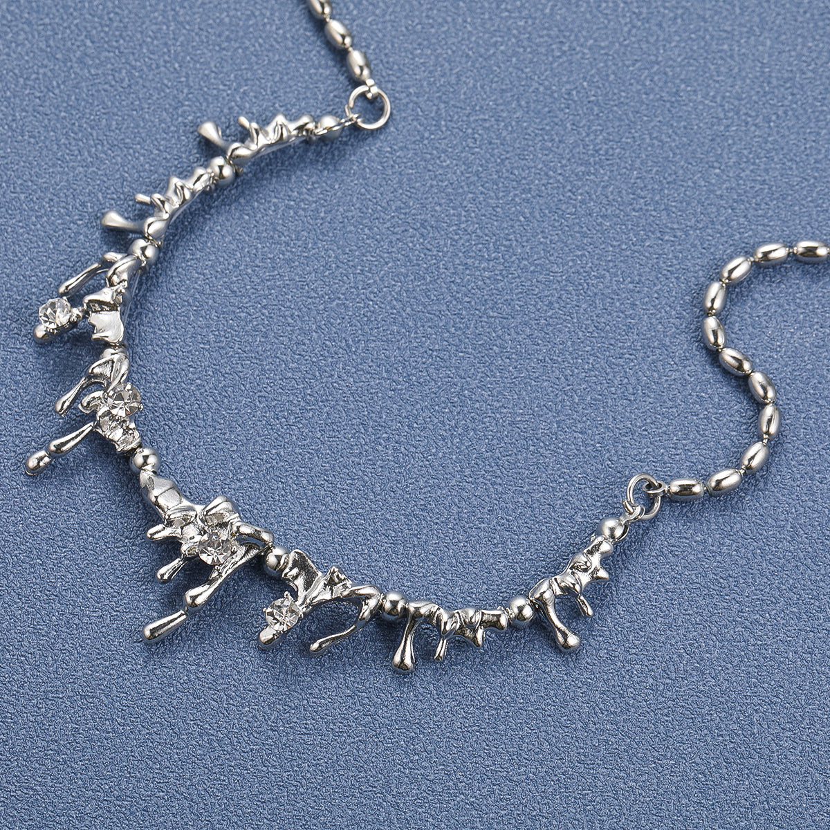 Cubic Zirconia and Silver-Plated Lava Statement Necklace, silver pendant necklace for women, botanical inspired, side view