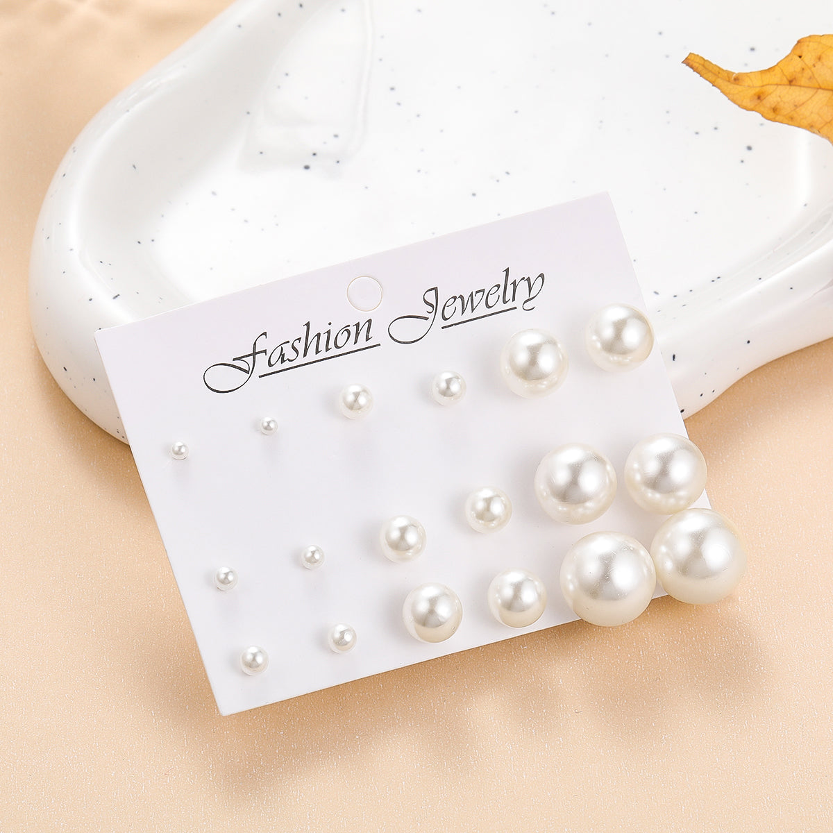 Pearl and Silver-Plated Round Stud Earrings Set, silver stud earrings for women, botanical inspired, front view