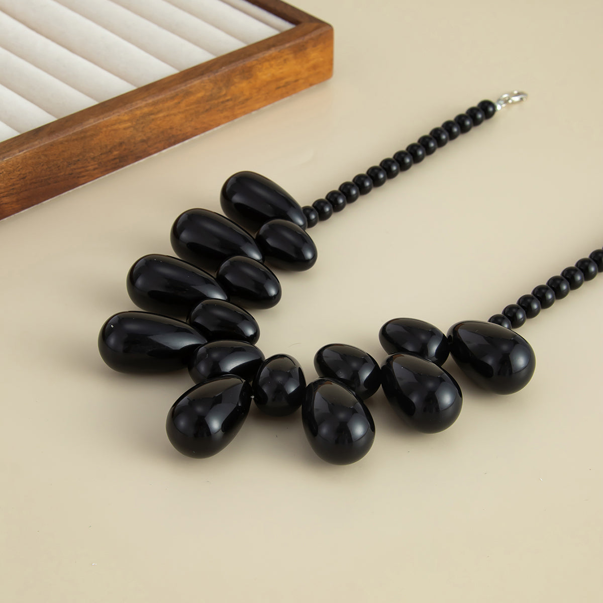 Black Resin and Silvertone Drops Collar Necklace, vintage-inspired design, side view