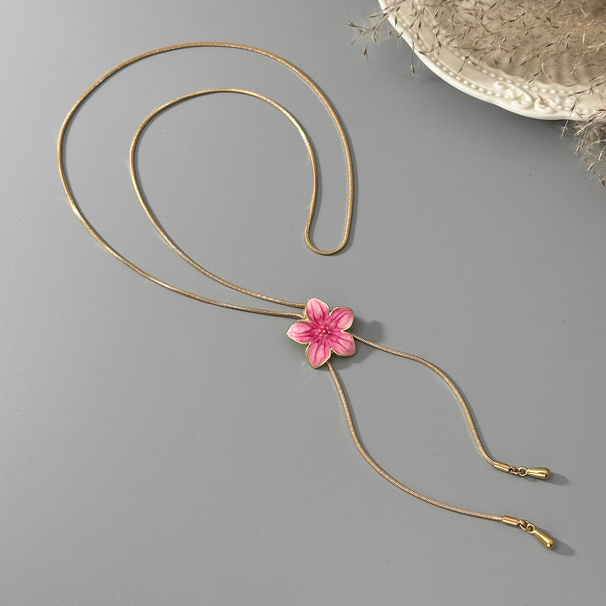 Pink Enamel and Goldtone Flower Tassel Pendant Necklace, vintage-inspired design, side view