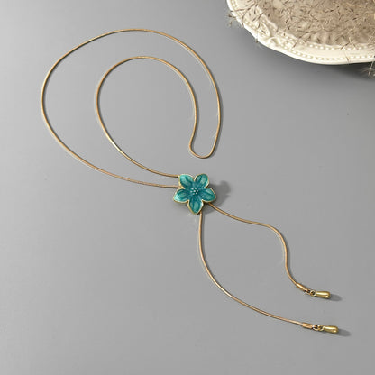 Blue Enamel and Goldtone Flower Tassel Pendant Necklace, everyday style, side view