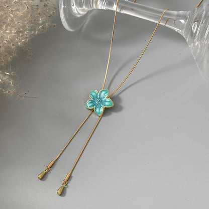 Blue Enamel and Goldtone Flower Tassel Pendant Necklace, everyday style, detail close-up